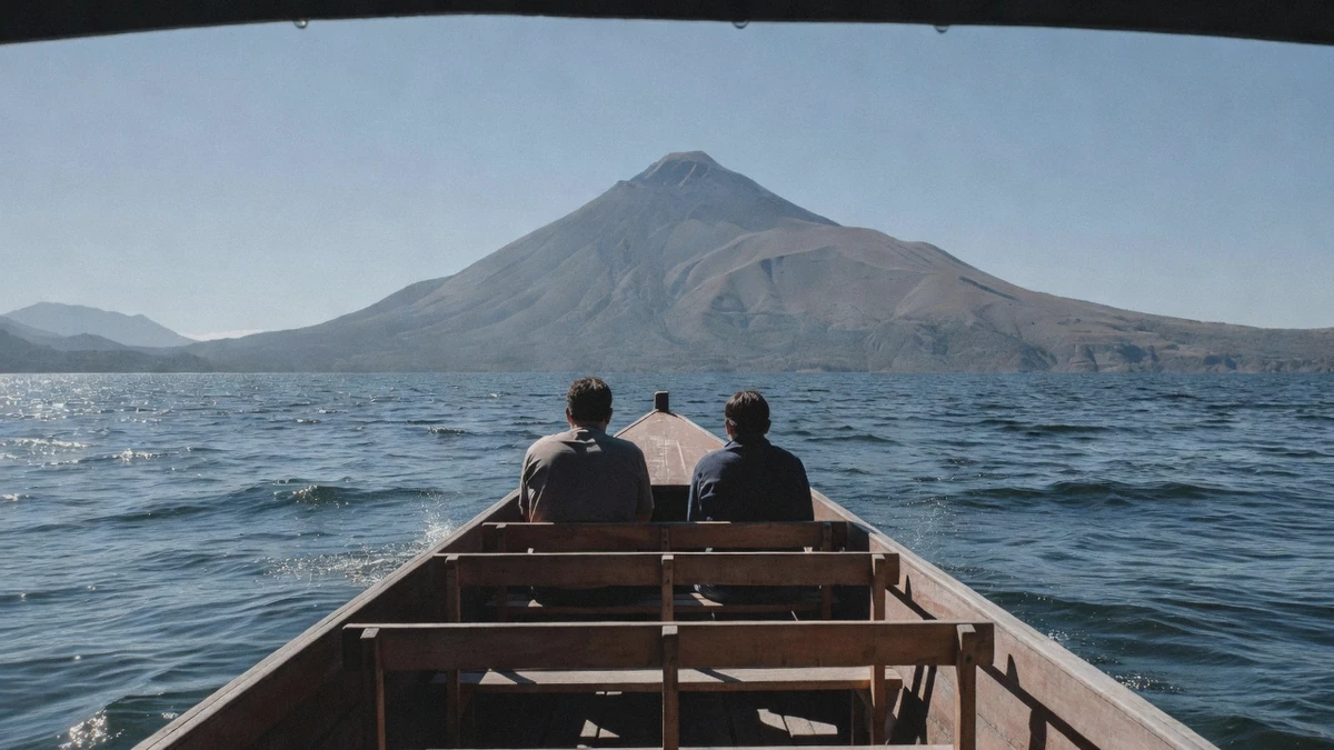 A boat navigating choppy water on Lake Atitlan in the afternoon during a Lake Atitlan boat tour