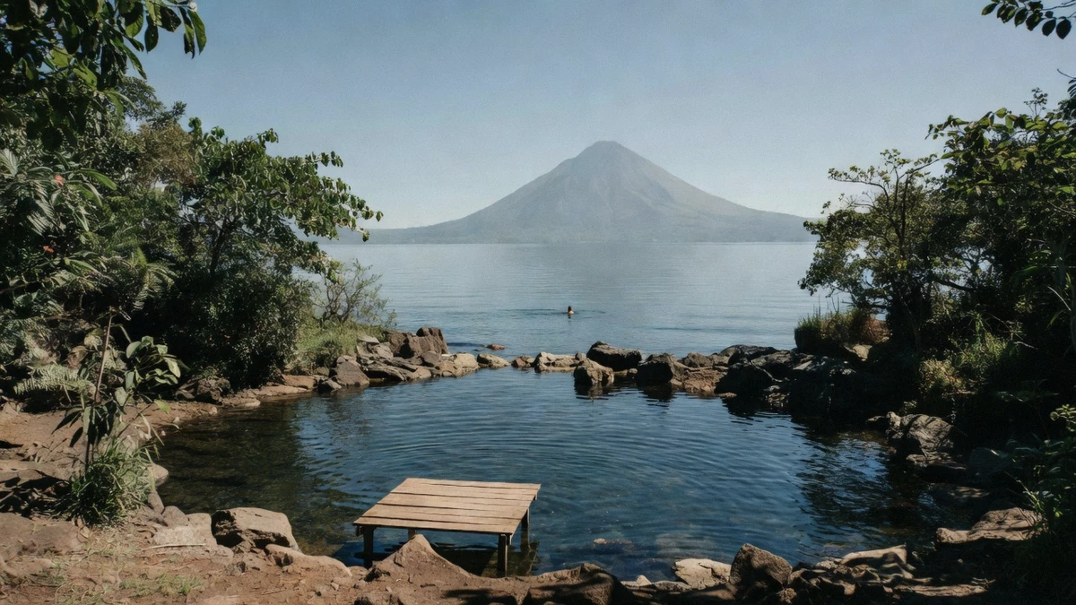 A rocky swimming cove on the shore of Lake Atitlán where visitors get in the water away from village docks