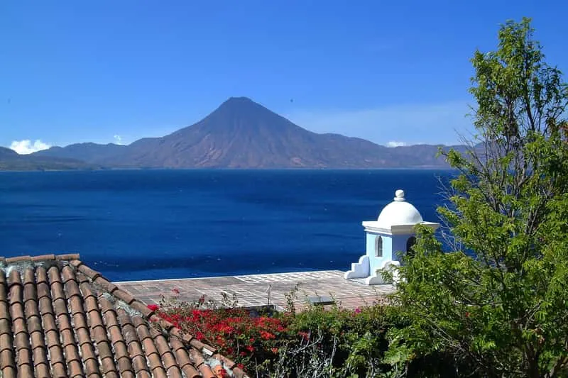 Tourists boarding a lancha at Panajachel dock for a guided Lake Atitlán boat cruise departing from Antigua Guatemala